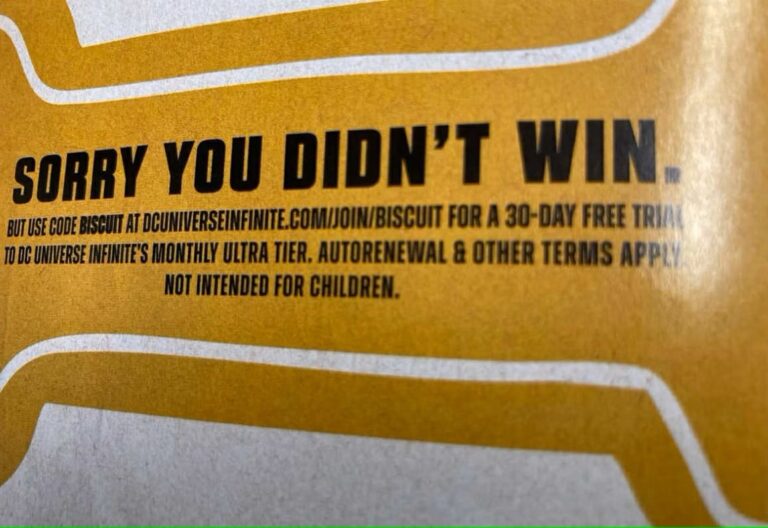 DC has left a promotional head scratcher for retailers.